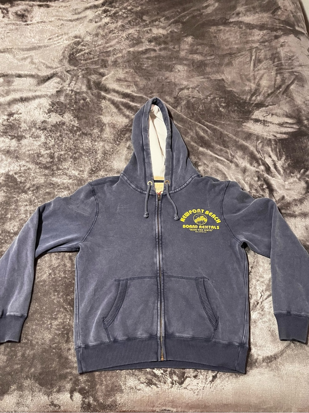 Hollister Navy Zip-Up Hoodie with Yellow Chest Graphic